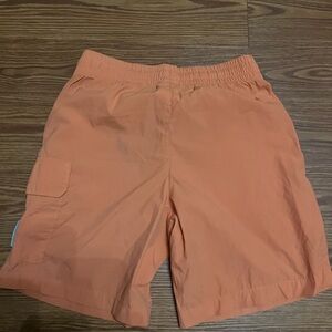 New Balance Men's Cargo Running Shorts in Orange Small